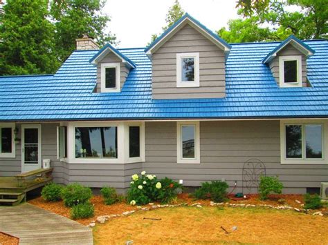 blue house gray metal roof|blue metal roof exterior home.